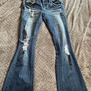 Almost Famous distressed flare stretchy jeans